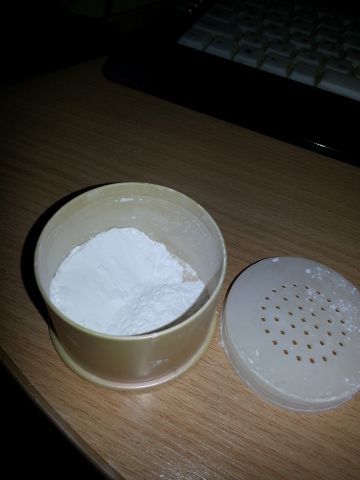 Рассыпчатая пудра Peach Sake silky finish powder от Skinfood фото 3